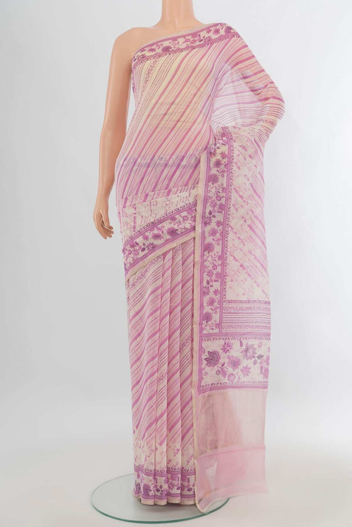 Cream Maheshwari Cotton Saree with Printed design on the body and Printed Border.  displayed on a mannequin