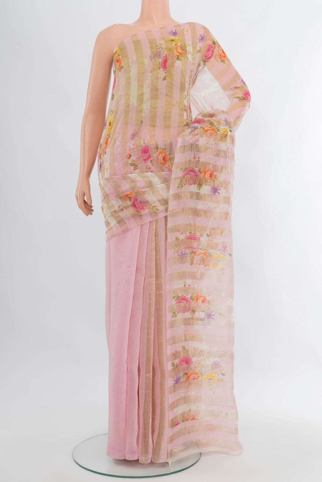 Rose pink Organza Silk Saree with Half And Half on the body and Without Border.  displayed on a mannequin