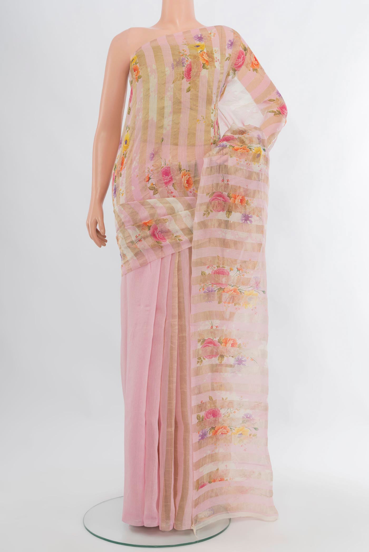 Rose pink Organza Silk Saree with Half And Half on the body and Without Border.  displayed on a mannequin