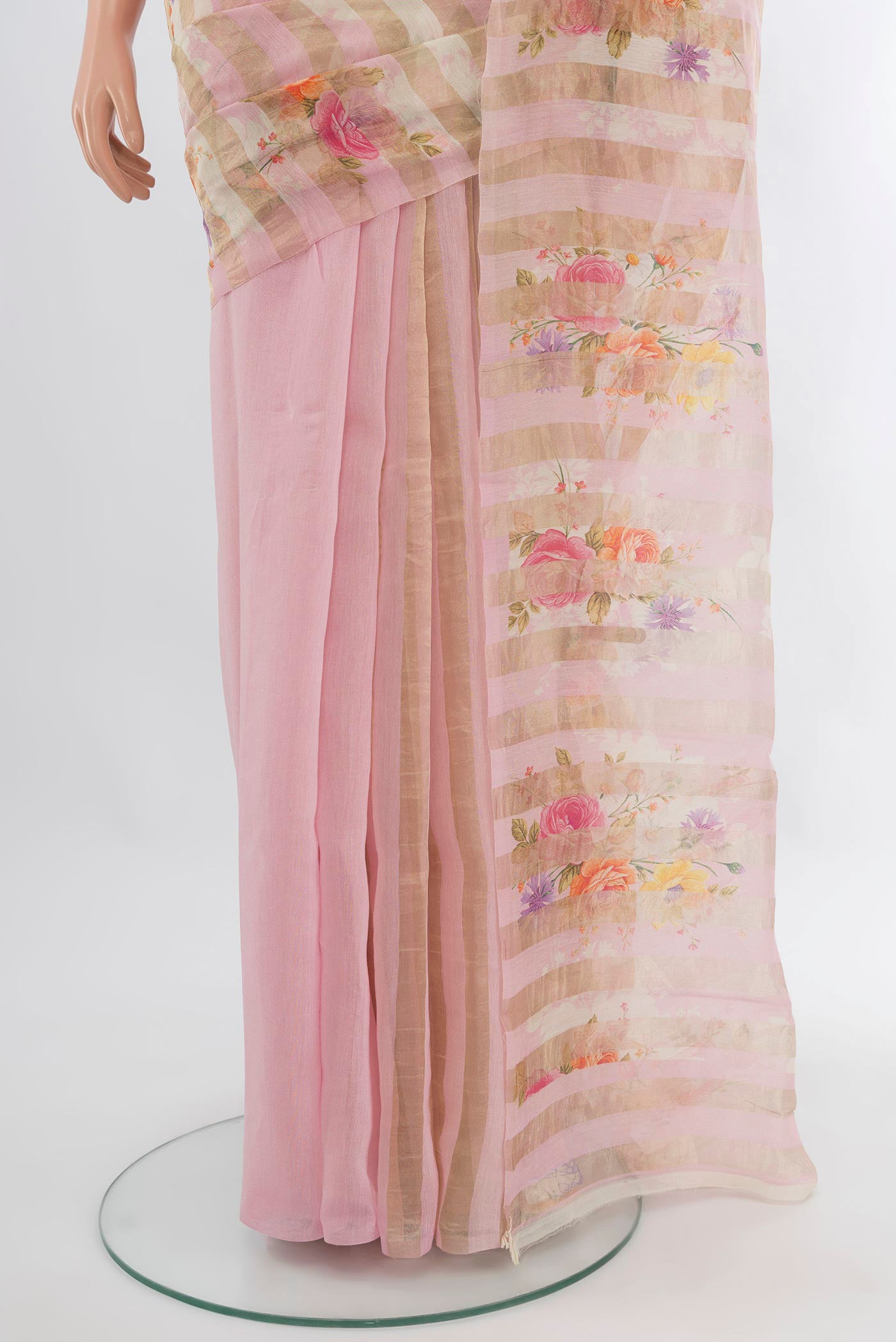 Pleats and pallu of Rose pink Organza Silk Saree with Half And Half on the body and Without Border. 