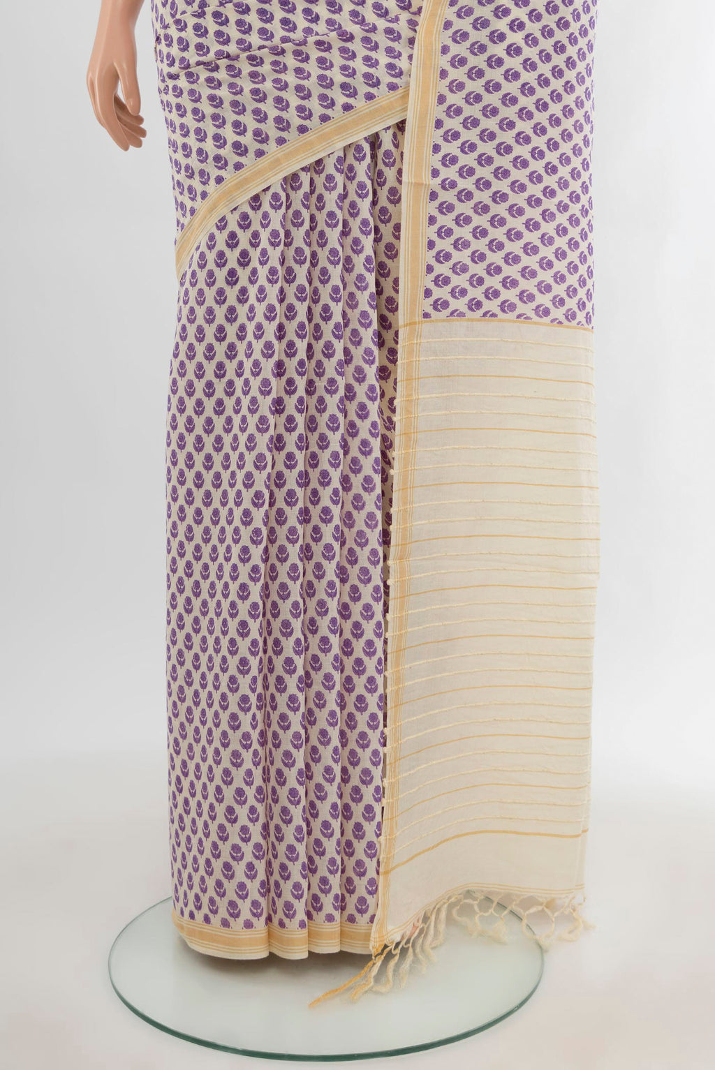 Pleats and pallu of Cream Tussar Silk Saree with Floral Print on the body and Plain Border. 
