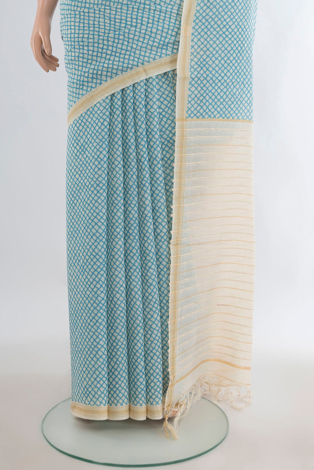 Pleats and pallu of Blue Tussar Saree with Printed design on the body and Plain Border. 