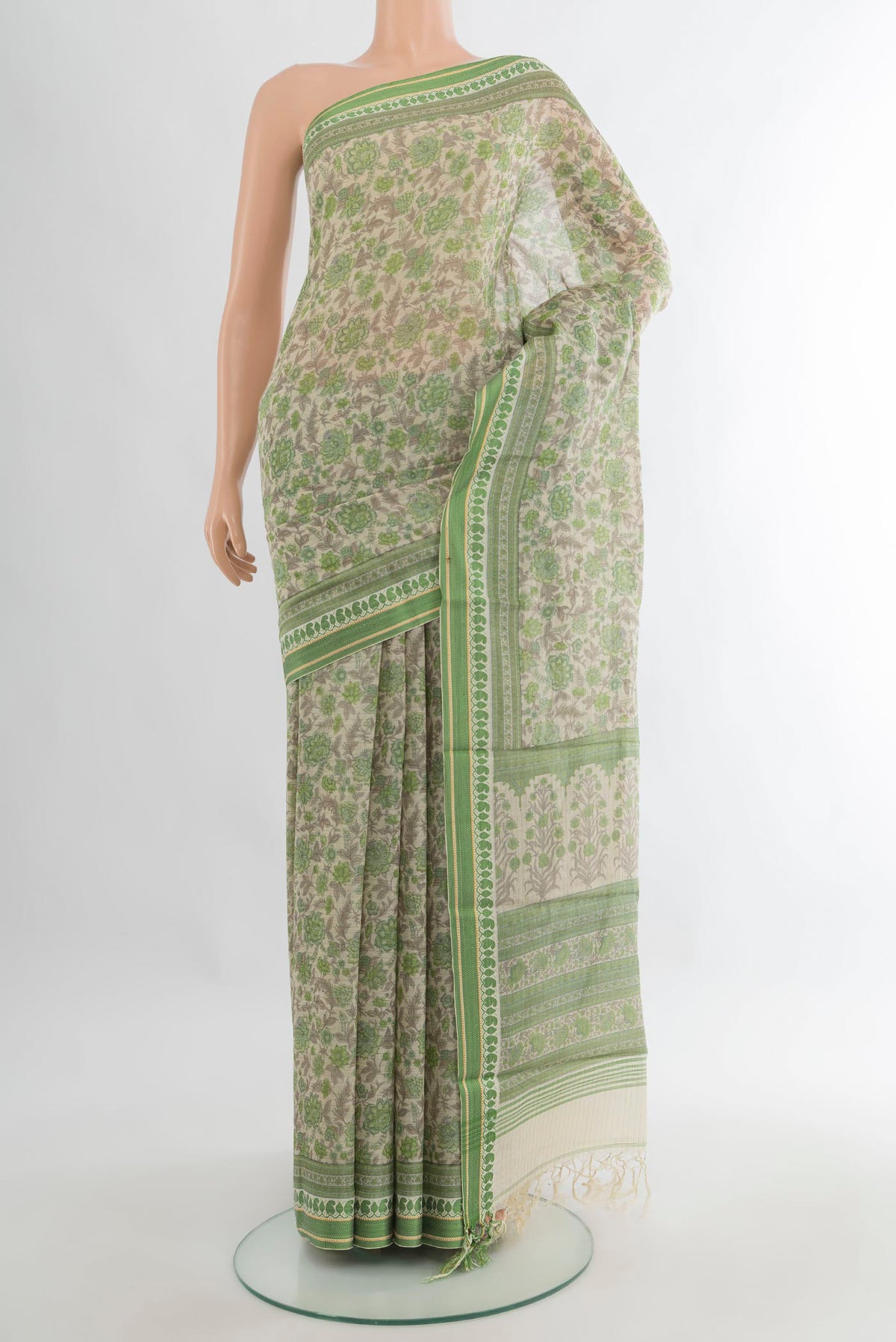 Cream Tussar Saree with Floral Print on the body and Thread Border.  displayed on a mannequin