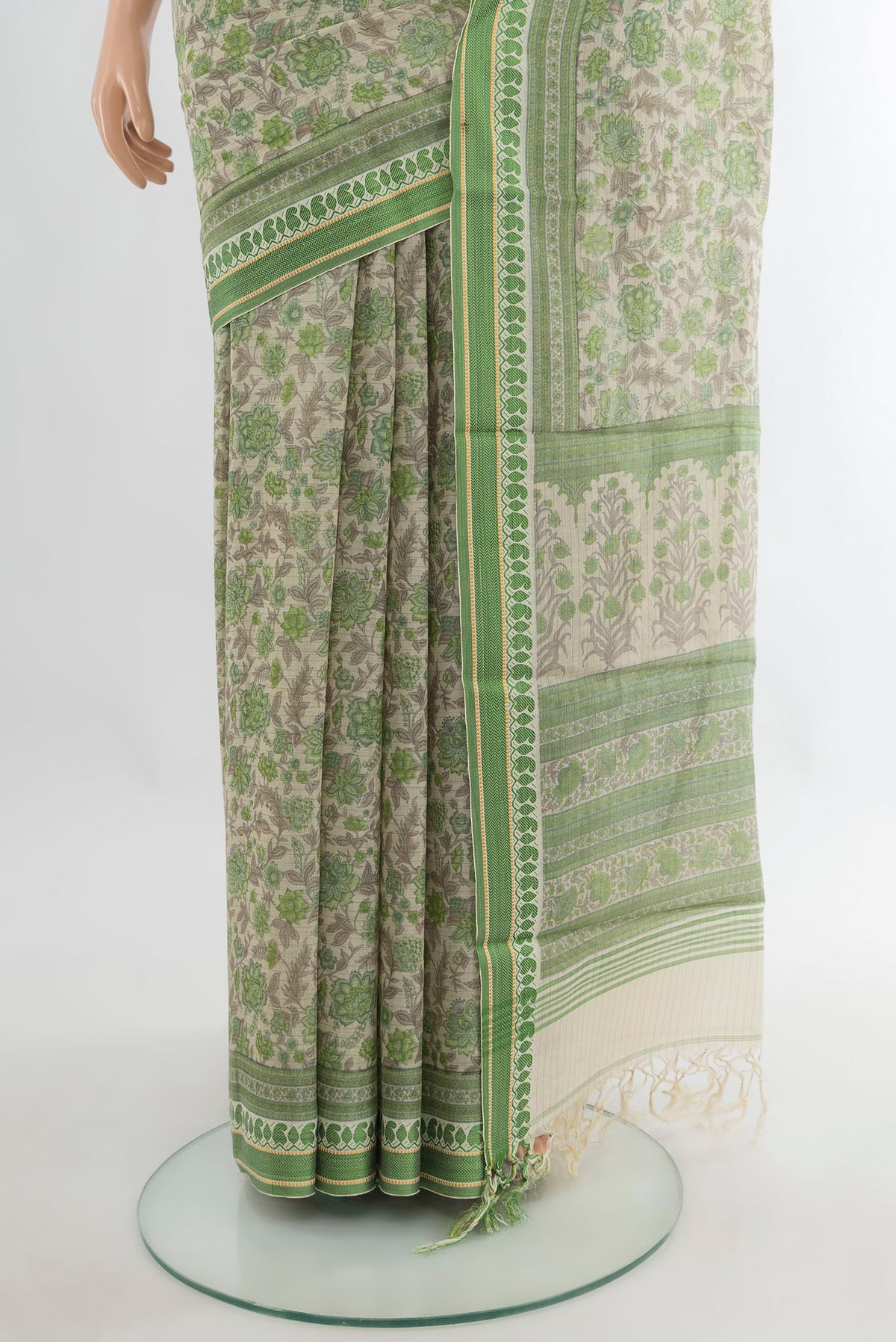Pleats and pallu of Cream Tussar Saree with Floral Print on the body and Thread Border. 