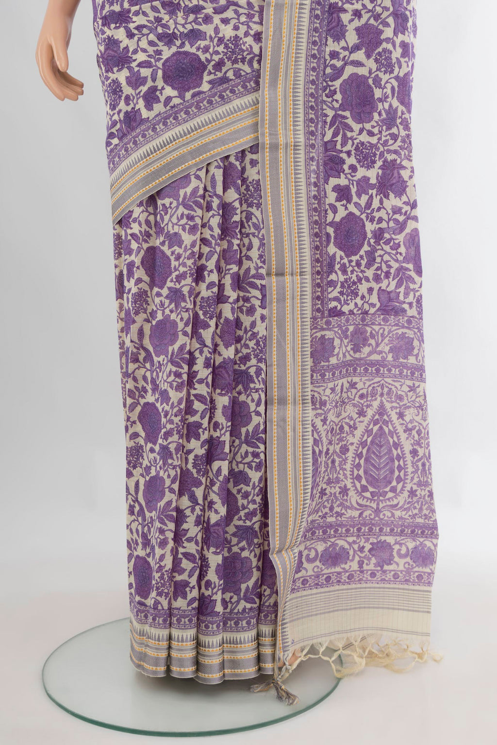 Pleats and pallu of Purple Tussar Saree with Floral Print on the body and Thread Border. 