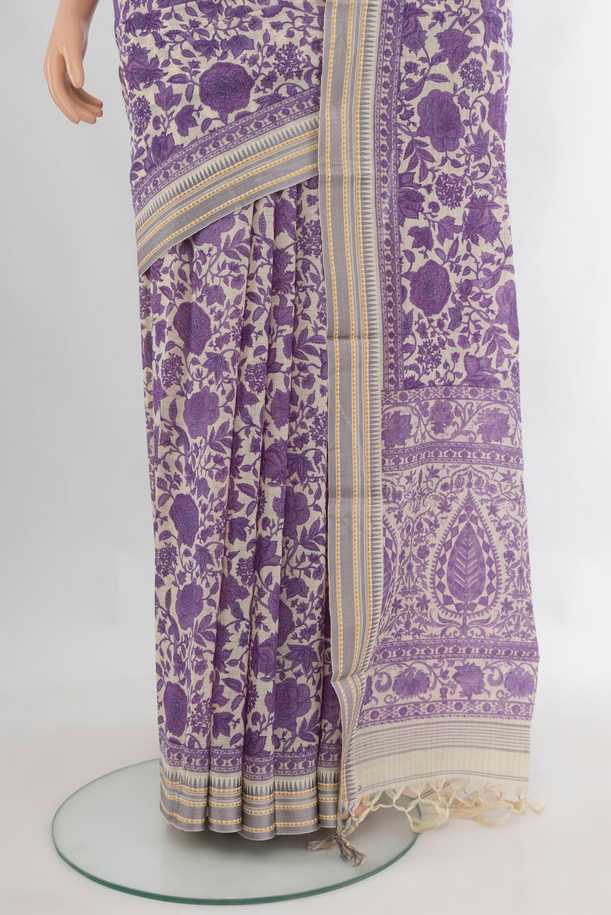 Pleats and pallu of Purple Tussar Saree with Floral Print on the body and Thread Border. 