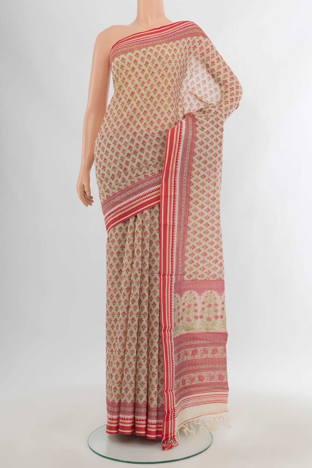 Beige Tussar Silk Saree with Floral Print on the body and Thread Border.  displayed on a mannequin