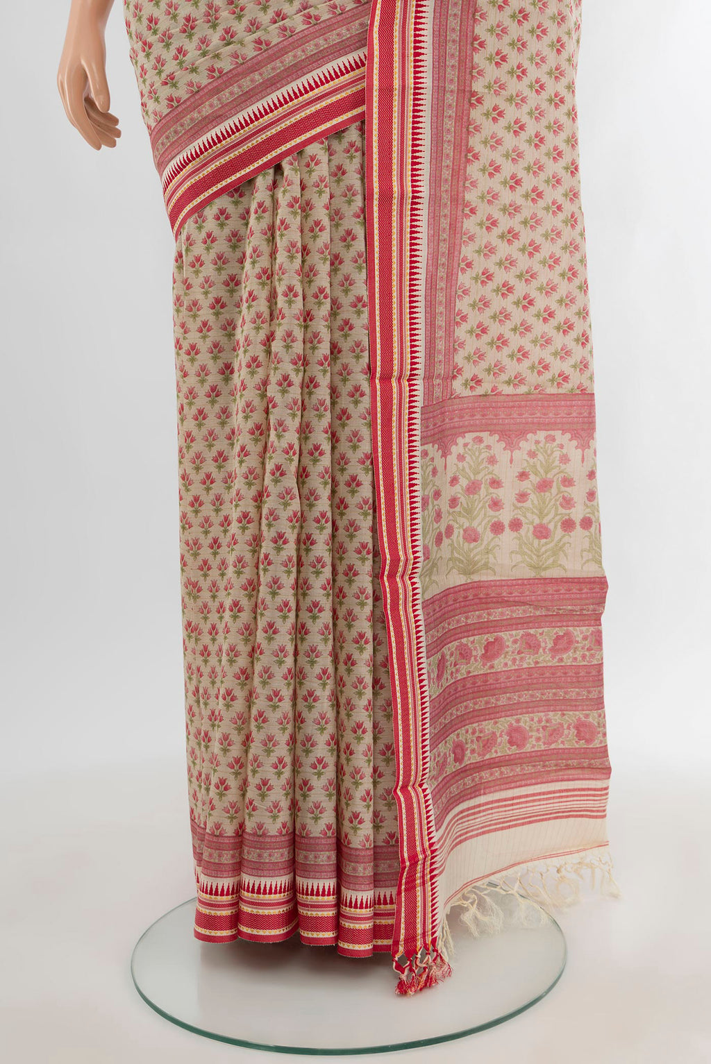 Pleats and pallu of Beige Tussar Silk Saree with Floral Print on the body and Thread Border. 