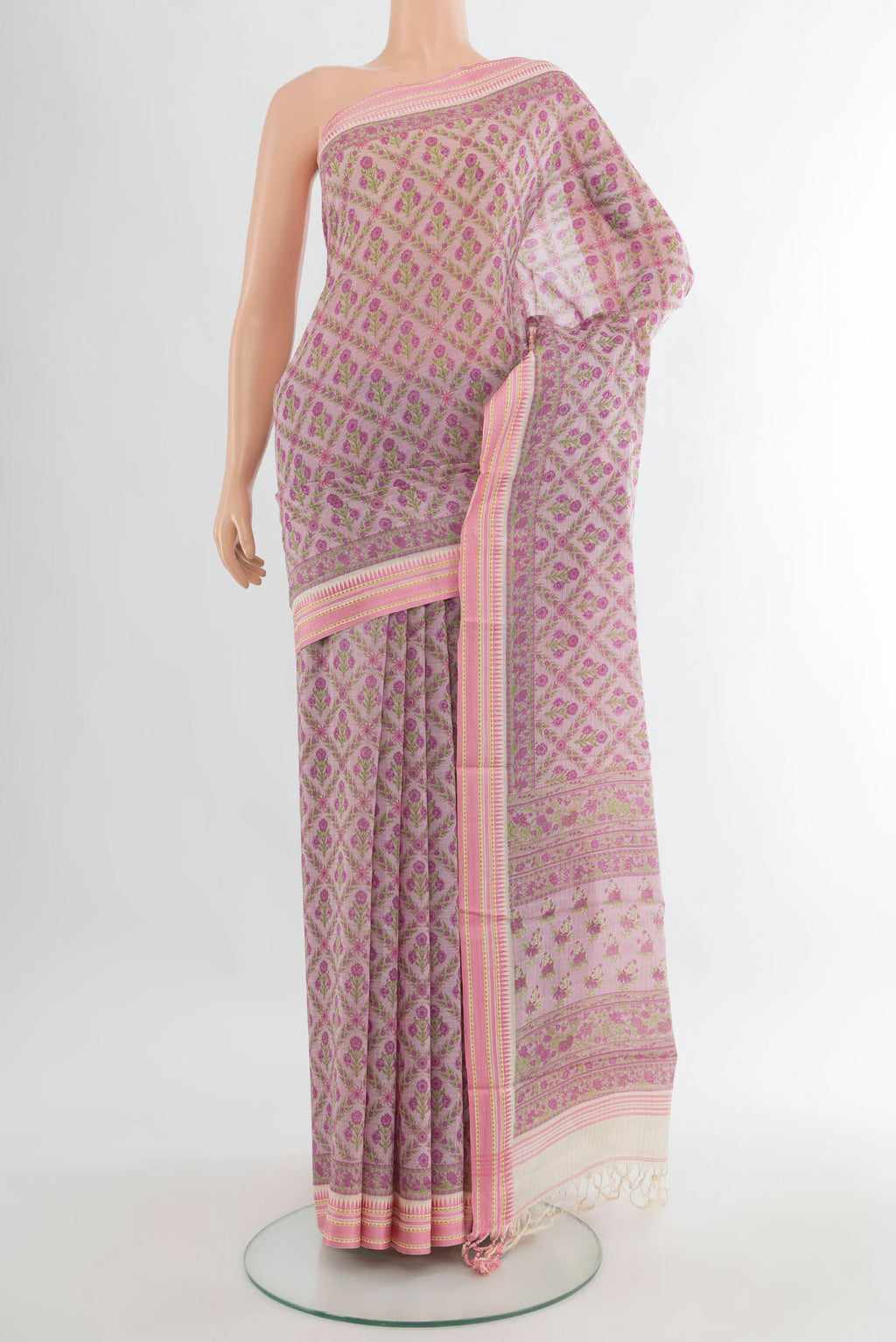 Rose Gold Tussar Saree with Floral Print on the body and Thread Border.  displayed on a mannequin