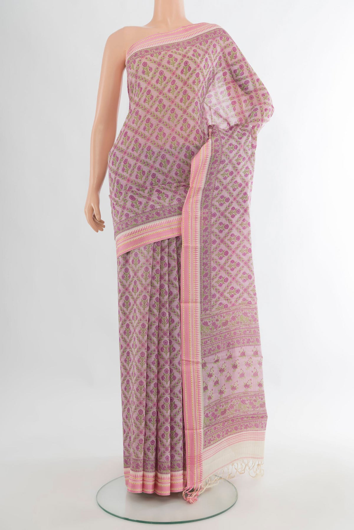 Rose Gold Tussar Saree with Floral Print on the body and Thread Border.  displayed on a mannequin