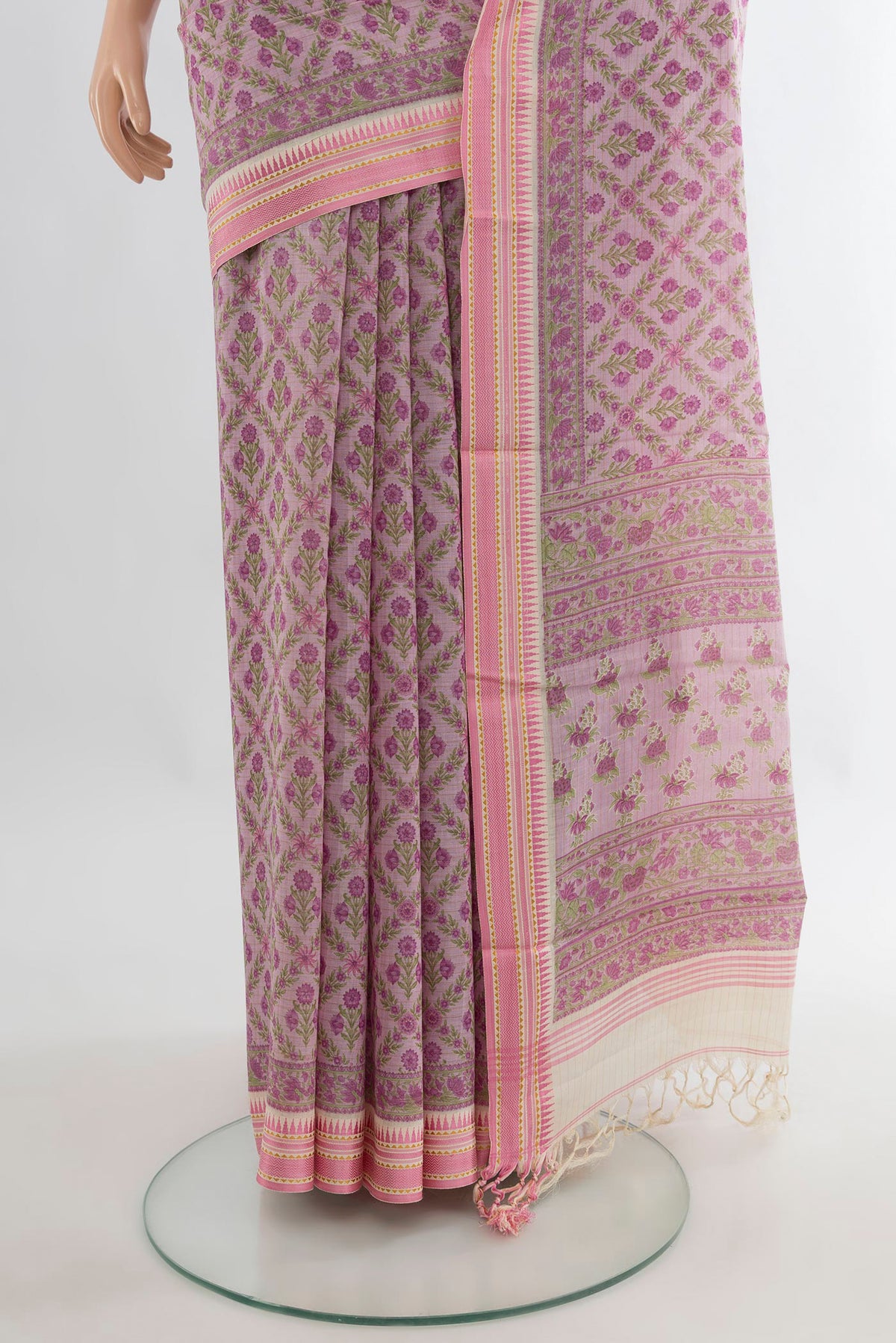 Pleats and pallu of Rose Gold Tussar Saree with Floral Print on the body and Thread Border. 