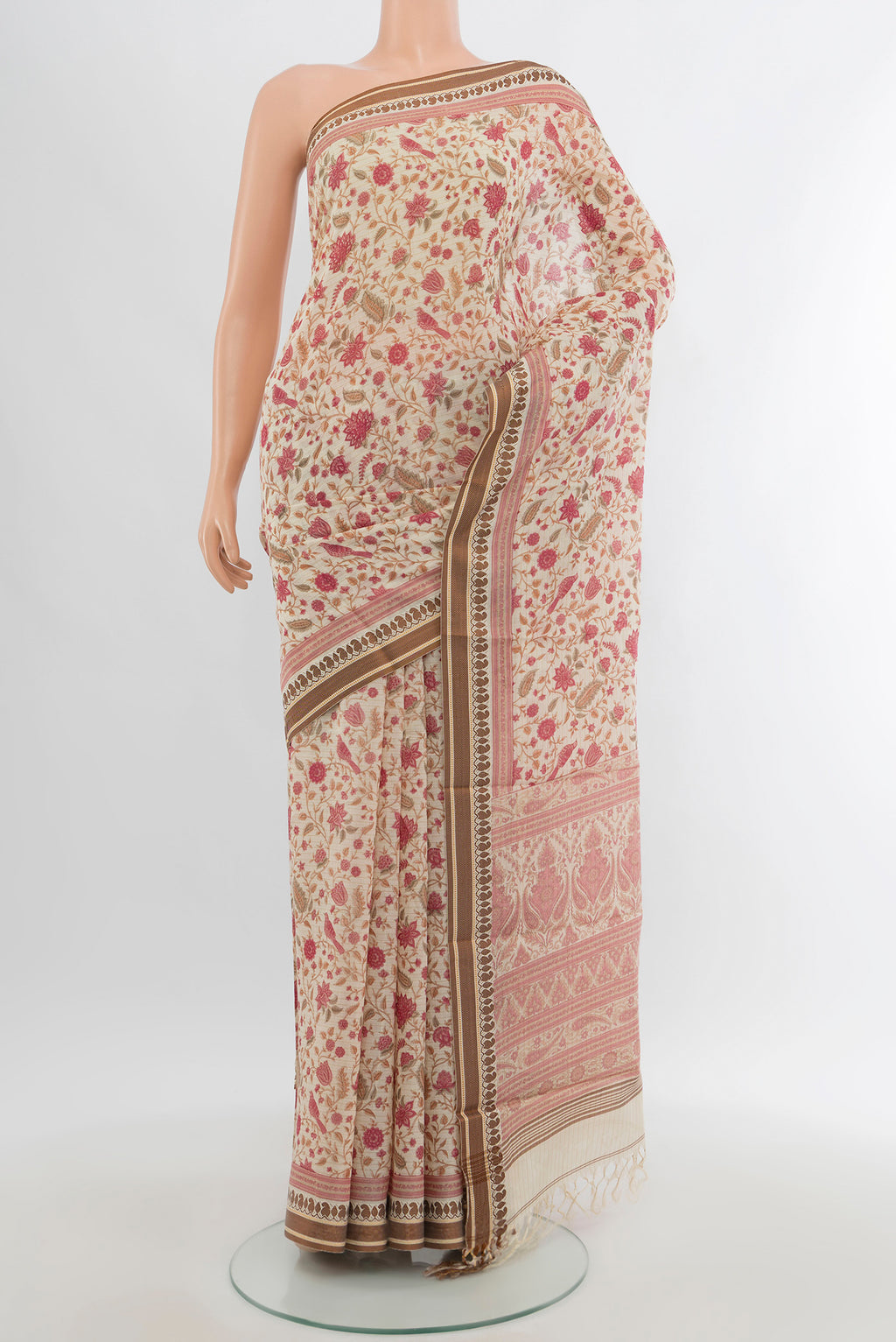 Cream Tussar Silk Saree with Floral Print on the body and Thread Border.  displayed on a mannequin