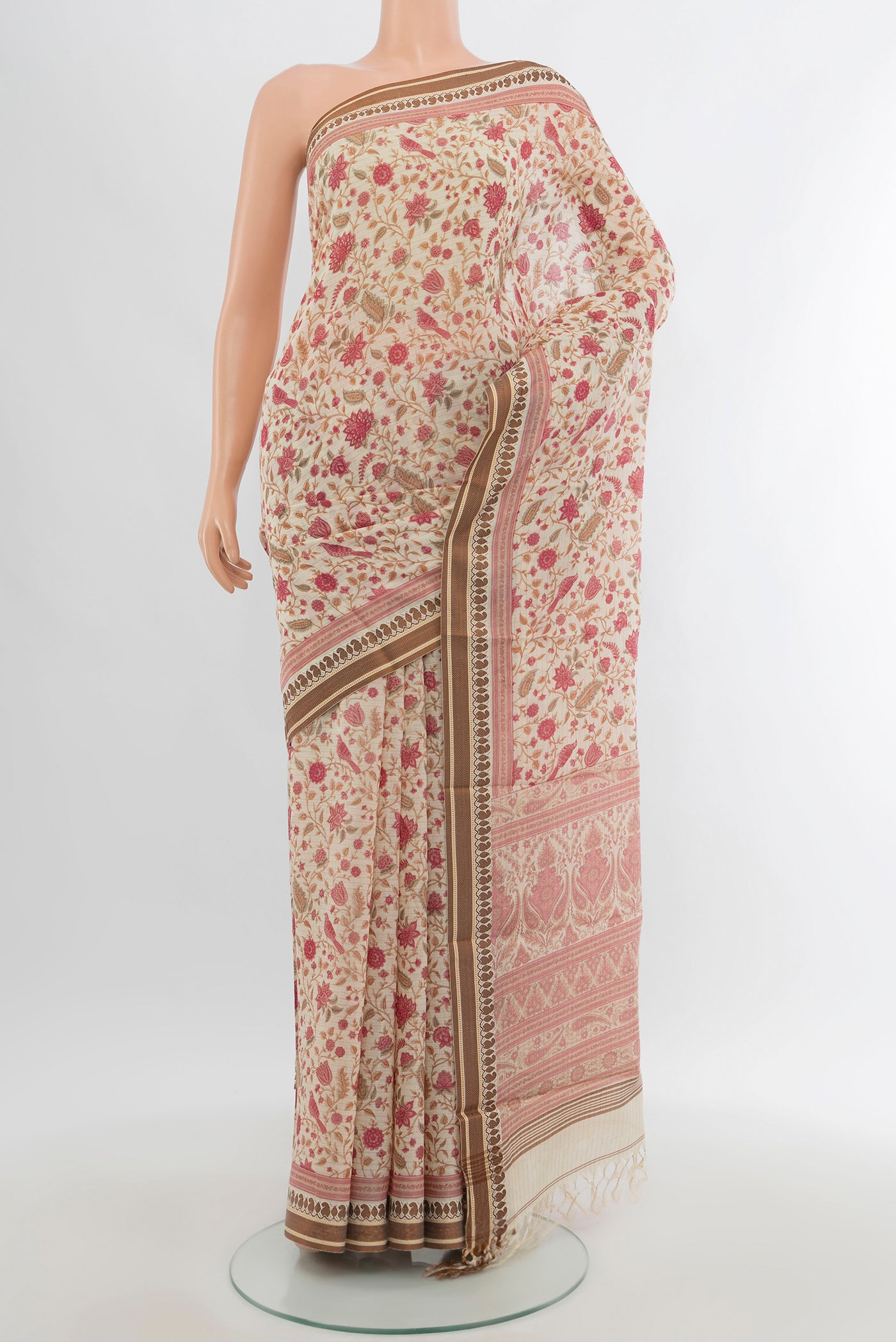 Cream Tussar Silk Saree with Floral Print on the body and Thread Border.  displayed on a mannequin
