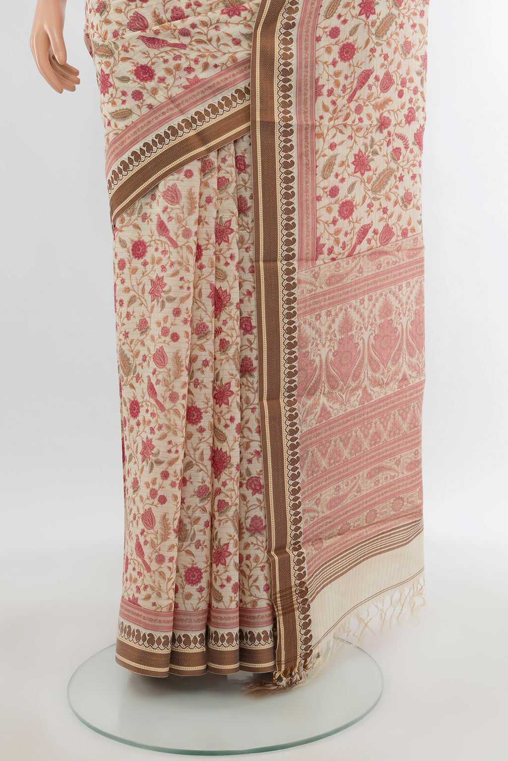 Pleats and pallu of Cream Tussar Silk Saree with Floral Print on the body and Thread Border. 