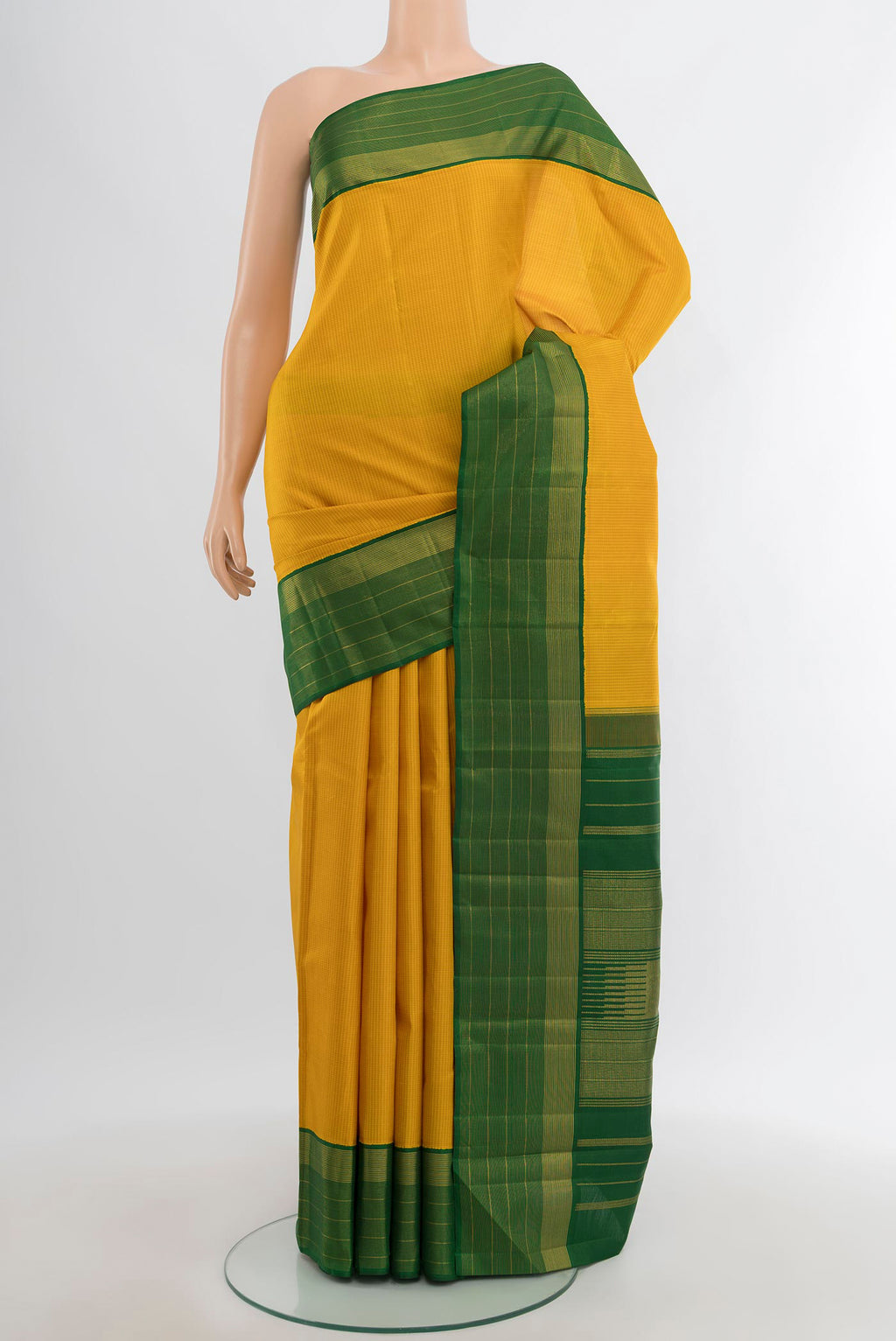 Yellow Kanjivaram Silk Saree with Checked design on the body and Zari Border.  displayed on a mannequin