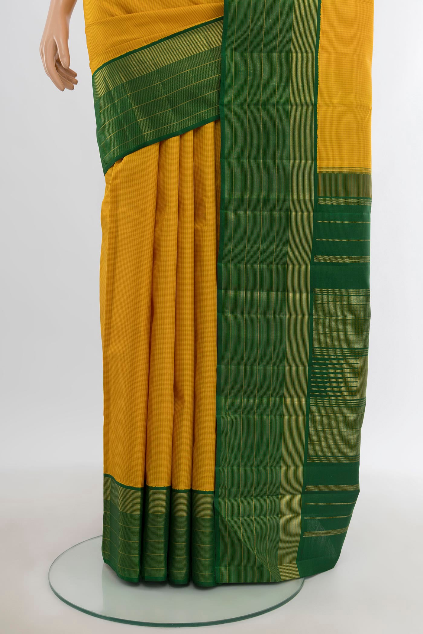 Pleats and pallu of Yellow Kanjivaram Silk Saree with Checked design on the body and Zari Border. 