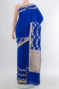 Royal Blue Banarasi Silk Saree with Plain Body and Zari Border.  displayed on a mannequin