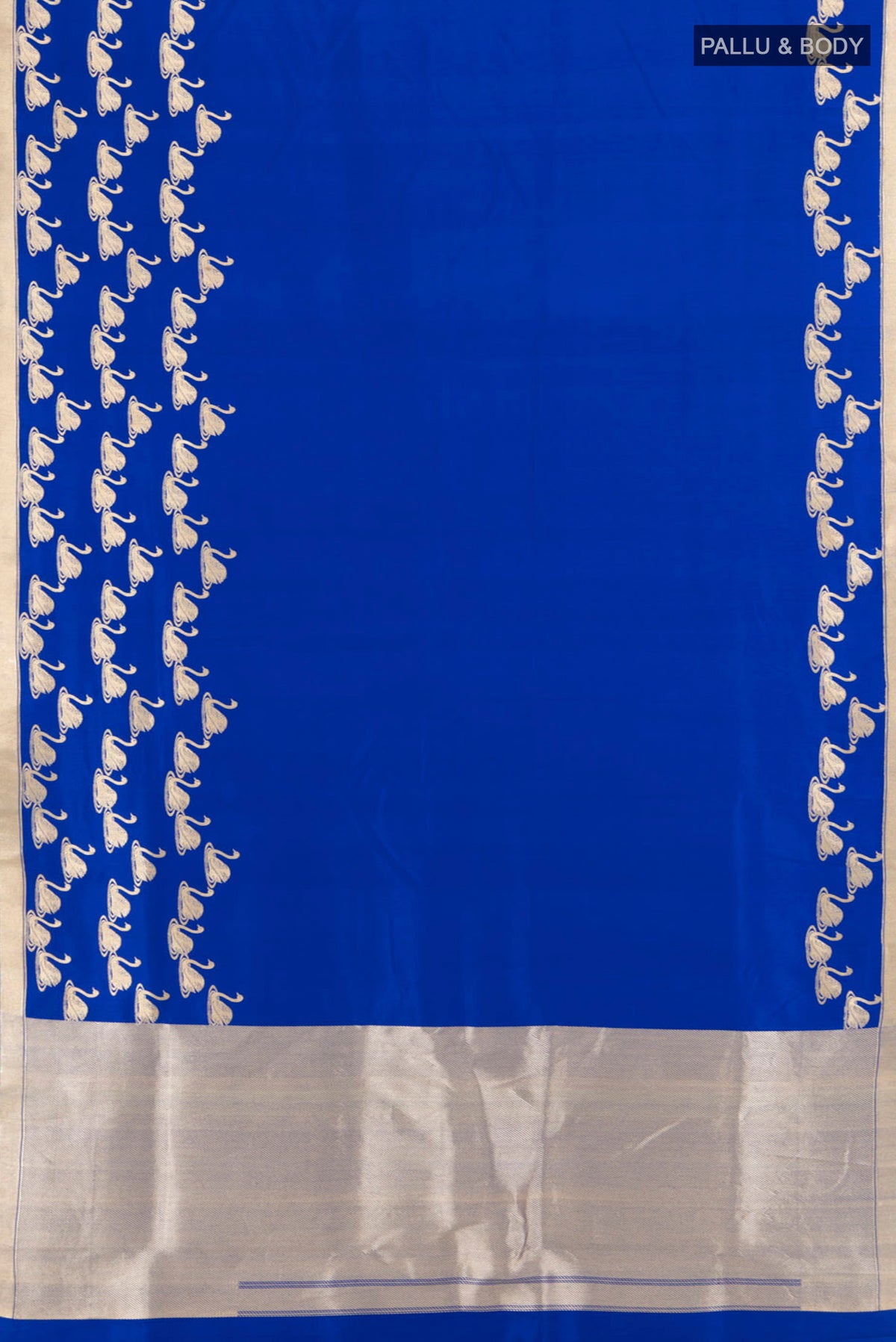 Flat view of Royal Blue Banarasi Silk Saree with Plain Body and Zari Border. 