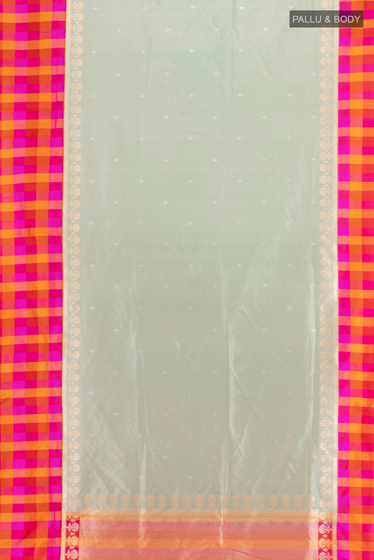 Flat view of Pista Green Banarasi Silk Saree with Zari Butta on the body and Fancy Border. 