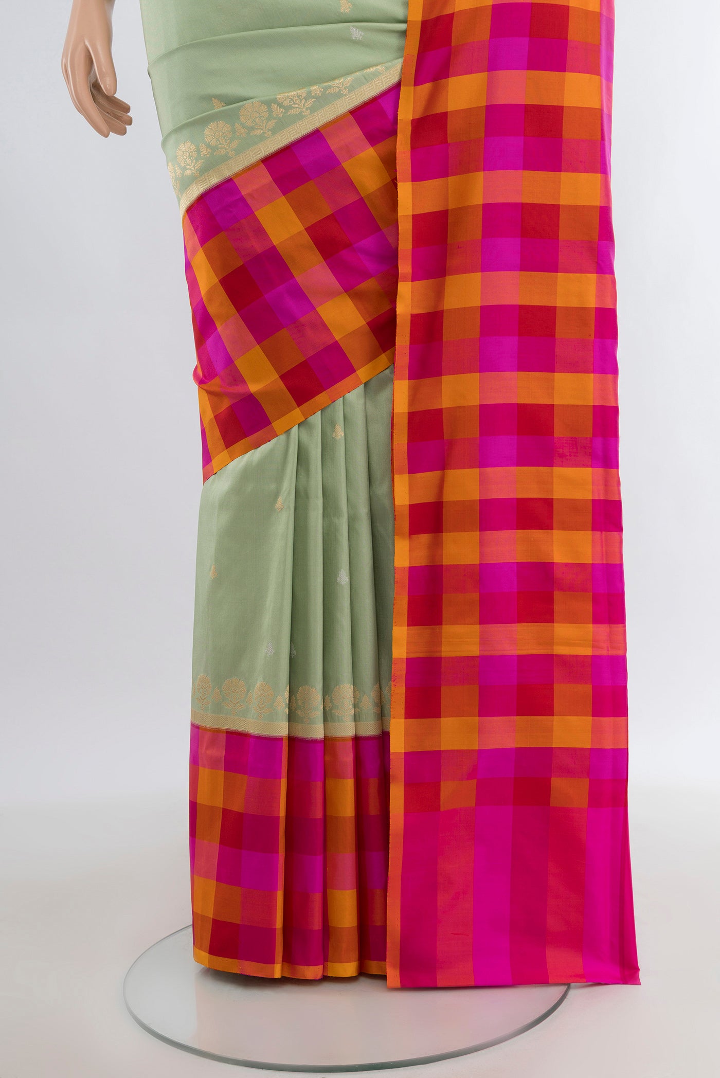 Pleats and pallu of Pista Green Banarasi Silk Saree with Zari Butta on the body and Fancy Border. 