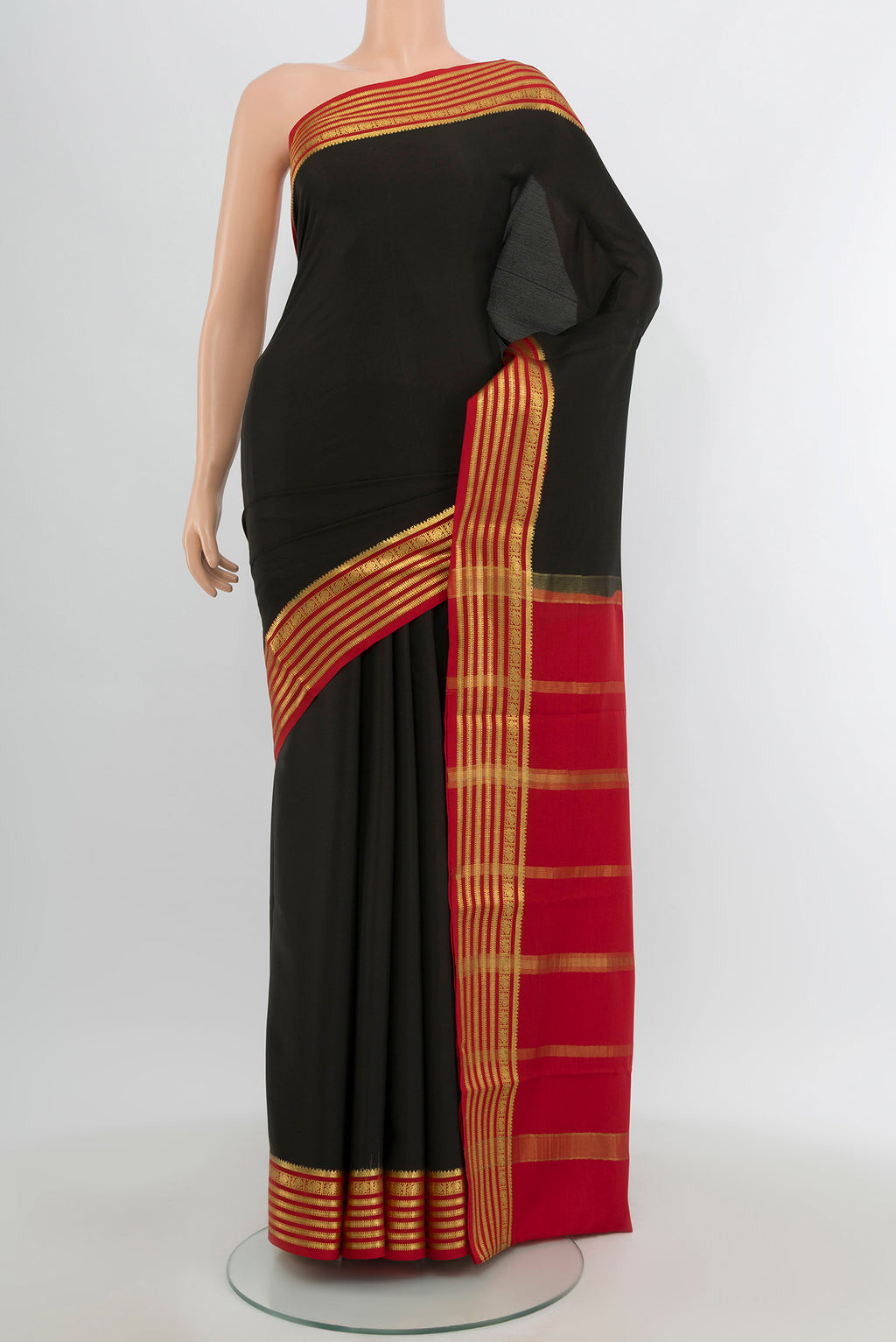 Black Mysore Crepe Saree with Plain Body and Zari Border.  displayed on a mannequin