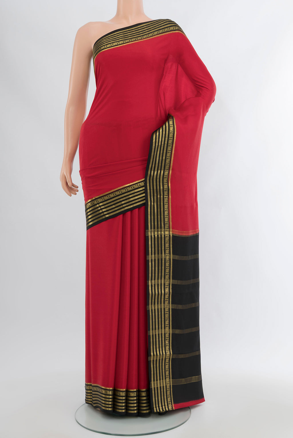 Red Mysore Crepe Saree with Plain Body and Zari Border.  displayed on a mannequin