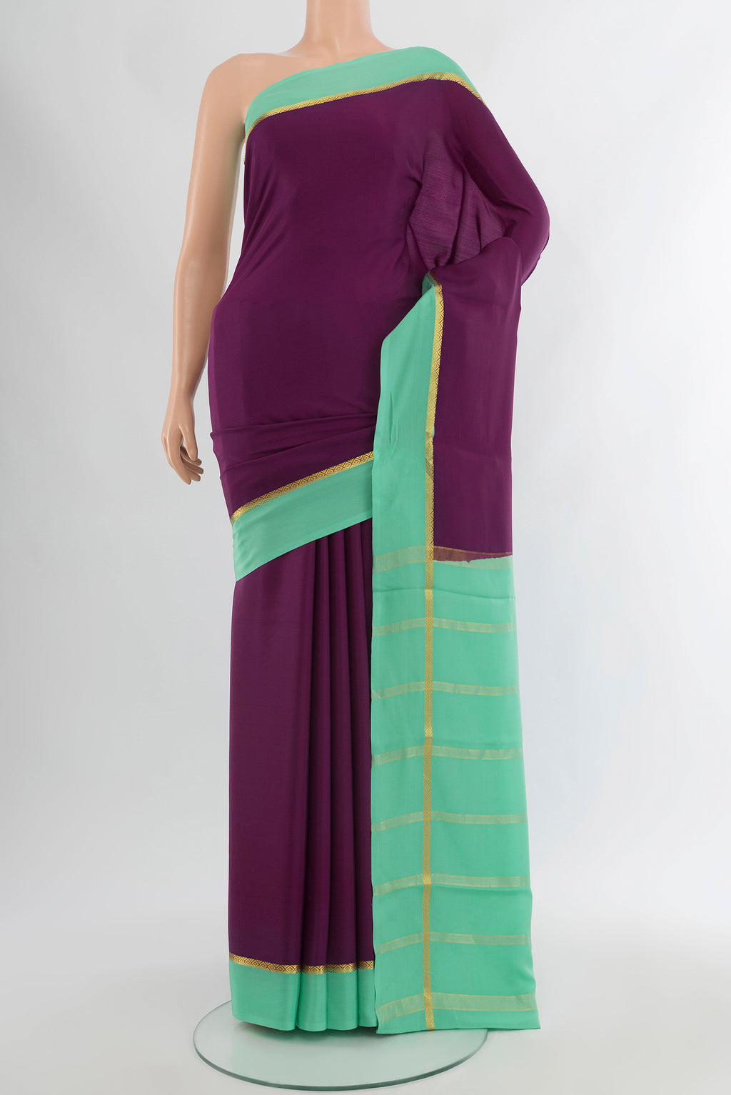 Purple Mysore Crepe Saree with Plain Body and Plain Border.  displayed on a mannequin