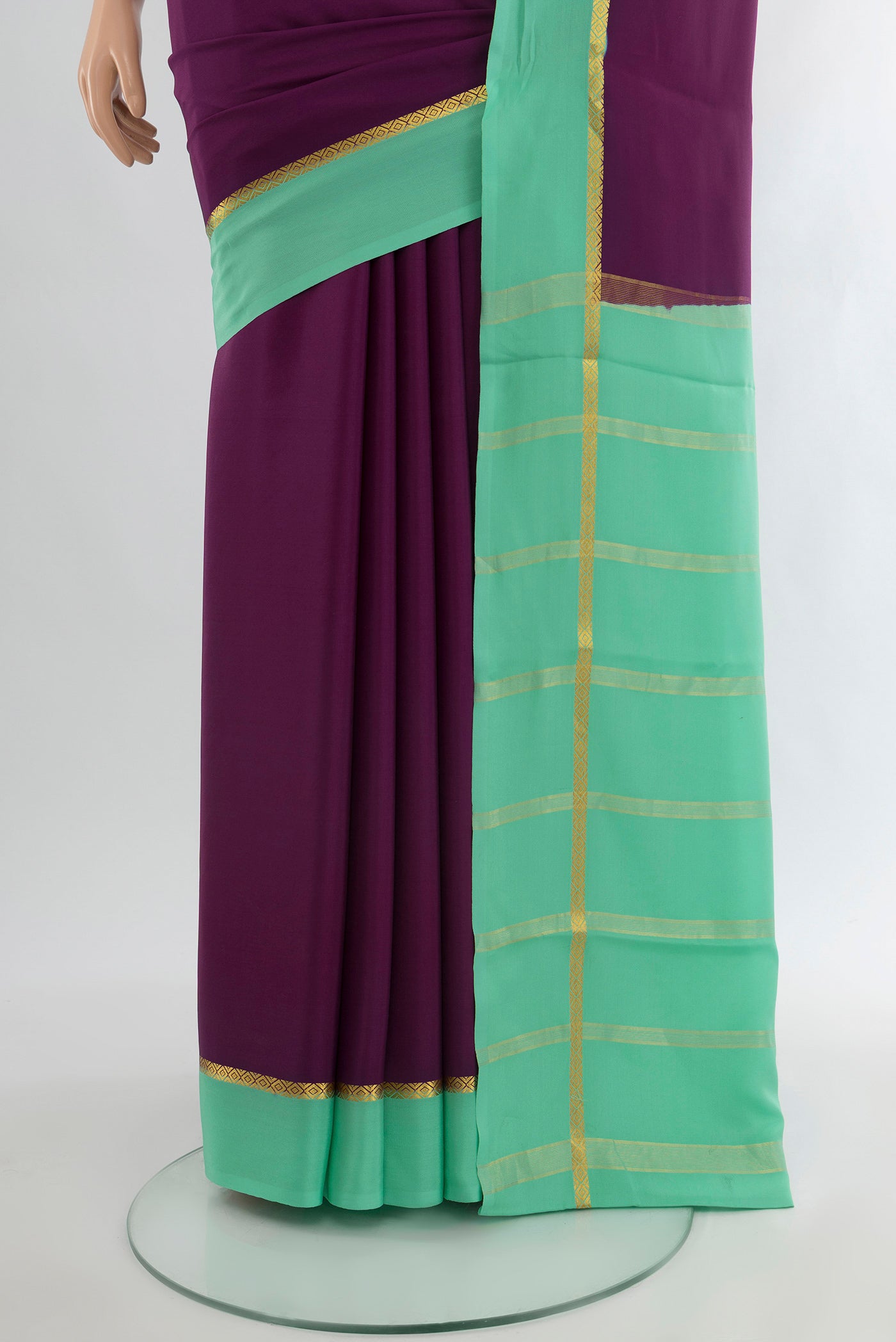 Pleats and pallu of Purple Mysore Crepe Saree with Plain Body and Plain Border. 