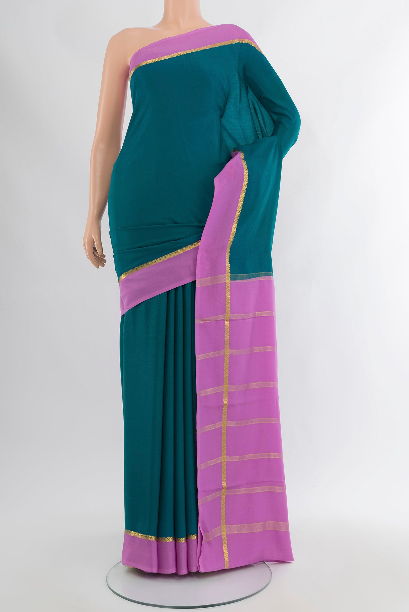 Blue Mysore Crepe Saree with Plain Body and Plain Border.  displayed on a mannequin