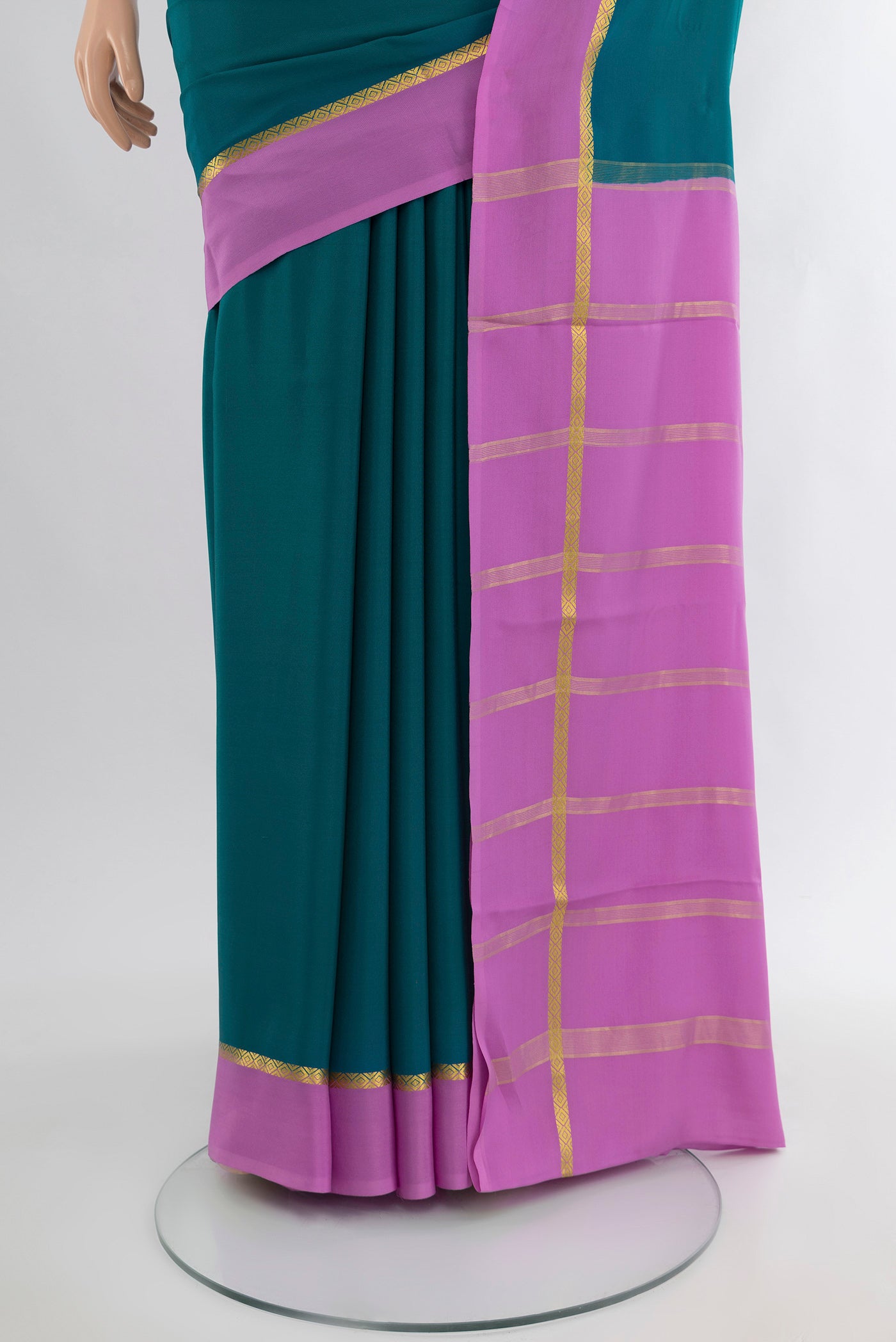 Pleats and pallu of Blue Mysore Crepe Saree with Plain Body and Plain Border. 