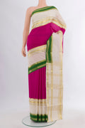 Magenta Mysore Crepe Saree with Plain Body and Zari Border.  displayed on a mannequin