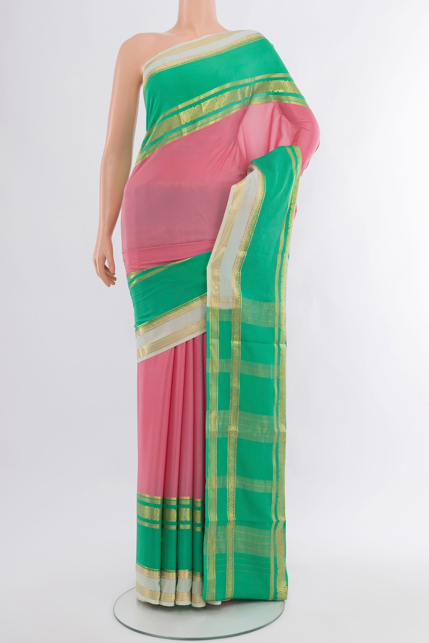 Pink Mysore Crepe Saree with Plain Body and Zari Border.  displayed on a mannequin