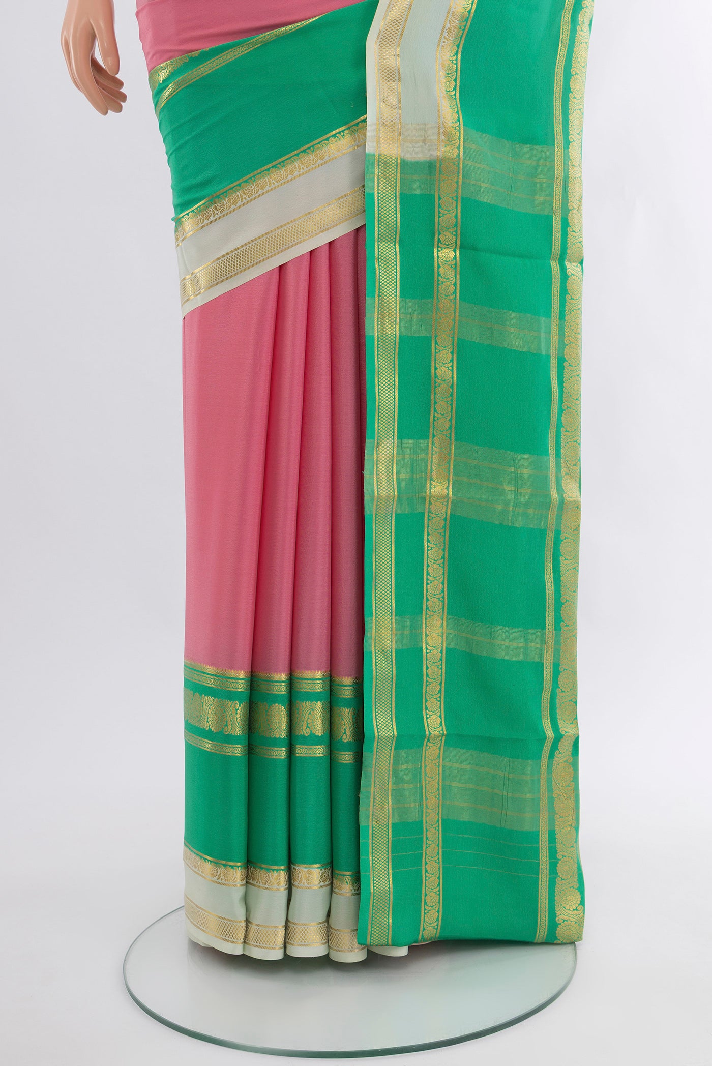 Pleats and pallu of Pink Mysore Crepe Saree with Plain Body and Zari Border. 