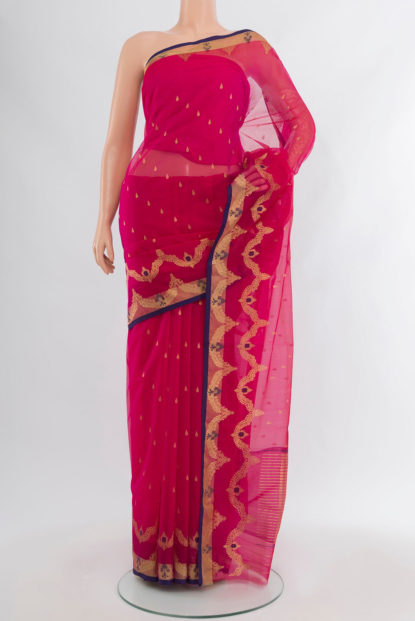 Pink Chanderi Silk Cotton Saree with Zari Butta on the body and Zari Border.  displayed on a mannequin