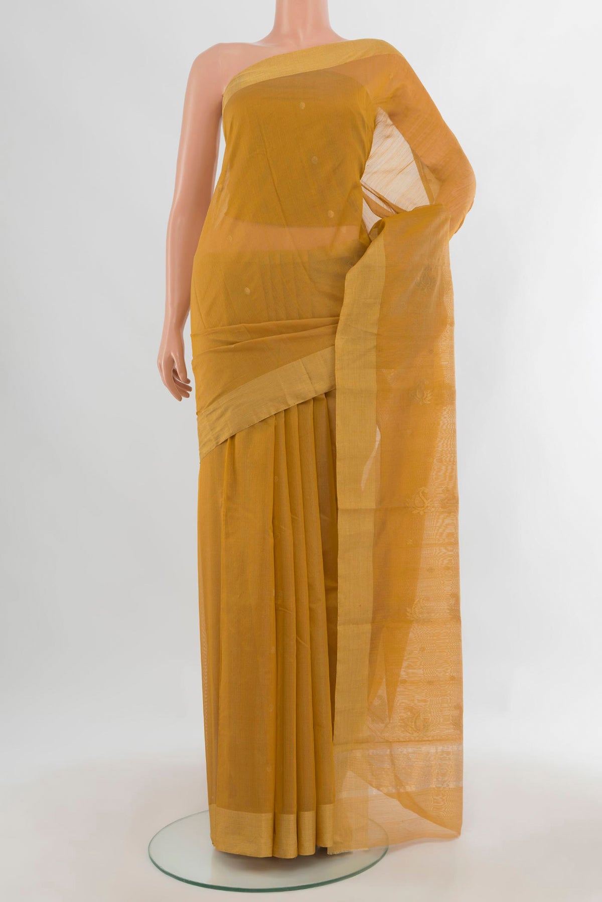 Sandal Chanderi Cotton Saree with Zari Butta on the body and Zari Border.  displayed on a mannequin