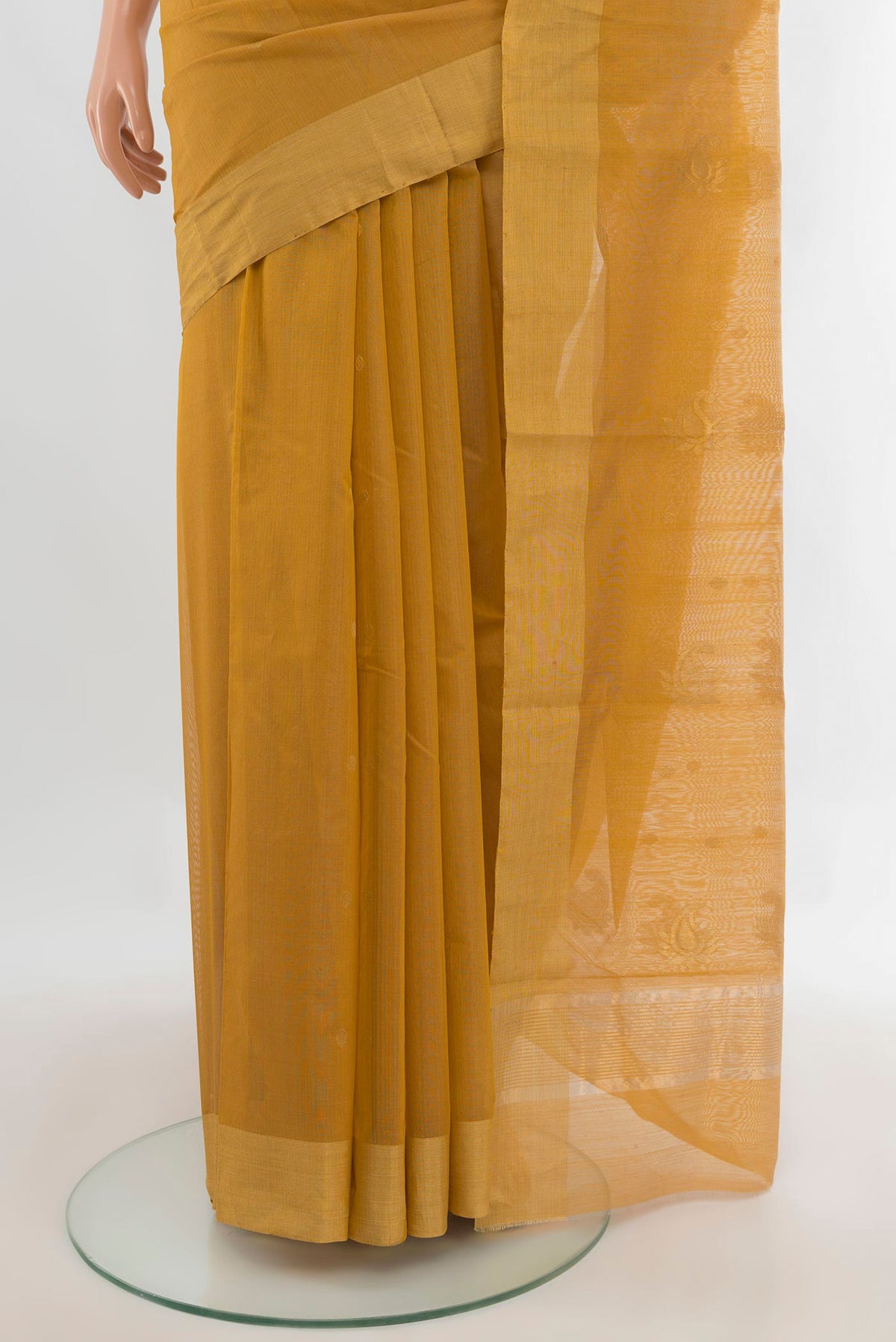 Pleats and pallu of Sandal Chanderi Cotton Saree with Zari Butta on the body and Zari Border. 