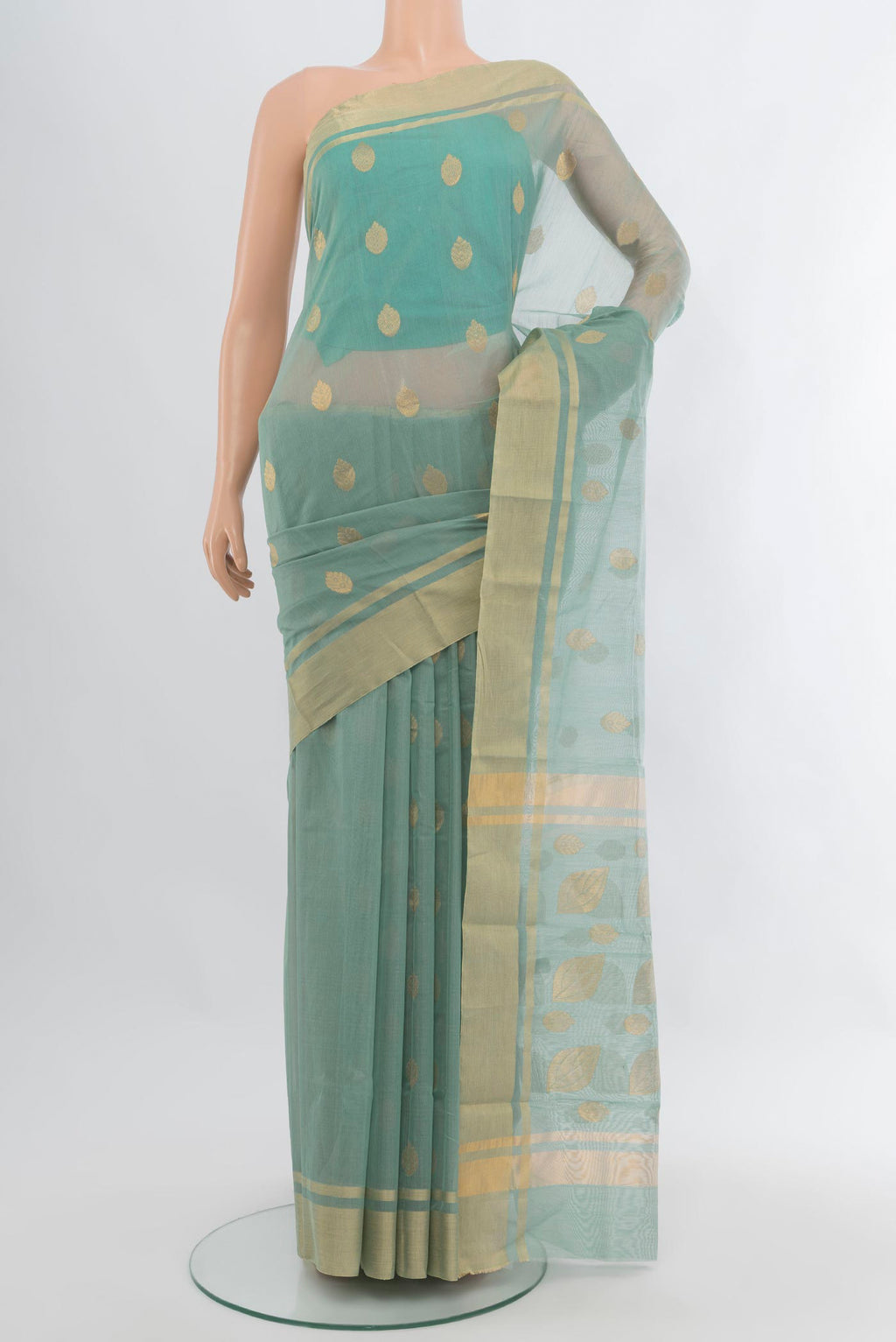 Blue Grey Chanderi Silk Cotton Saree with Zari Butta on the body and Zari Border.  displayed on a mannequin