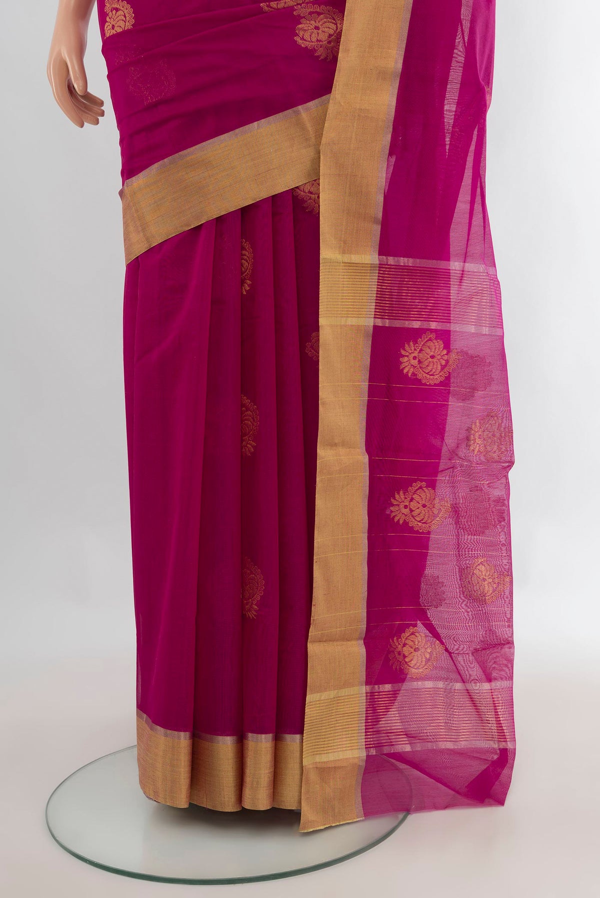 Pleats and pallu of Rani Pink Chanderi Cotton Saree with Zari Butta on the body and Zari Border. 