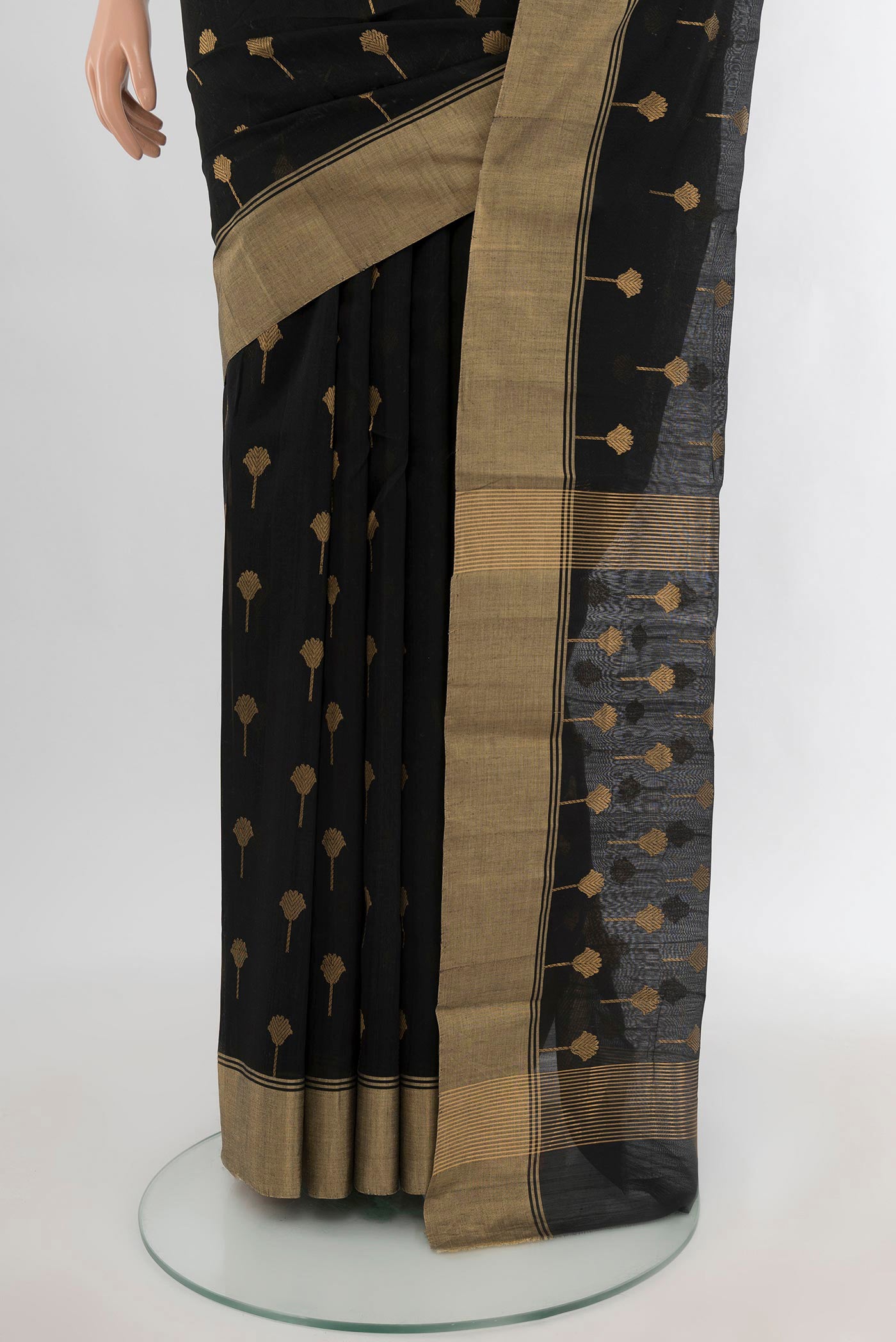 Pleats and pallu of Black Chanderi Silk Cotton Saree with Zari Butta on the body and Zari Border. 