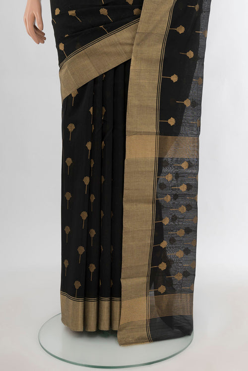 Pleats and pallu of Black Chanderi Silk Cotton Saree with Zari Butta on the body and Zari Border. 