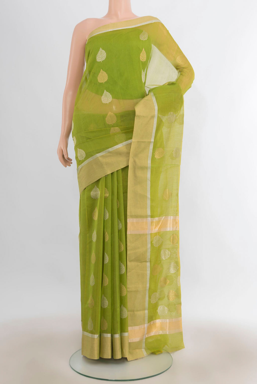 Parrot Green Chanderi Cotton Saree with Zari Butta on the body and Zari Border.  displayed on a mannequin