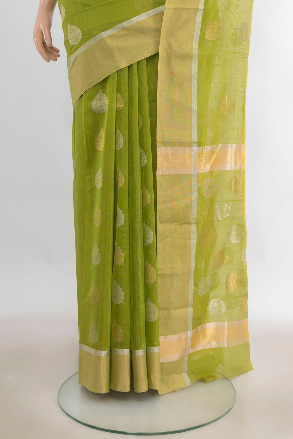 Pleats and pallu of Parrot Green Chanderi Cotton Saree with Zari Butta on the body and Zari Border. 