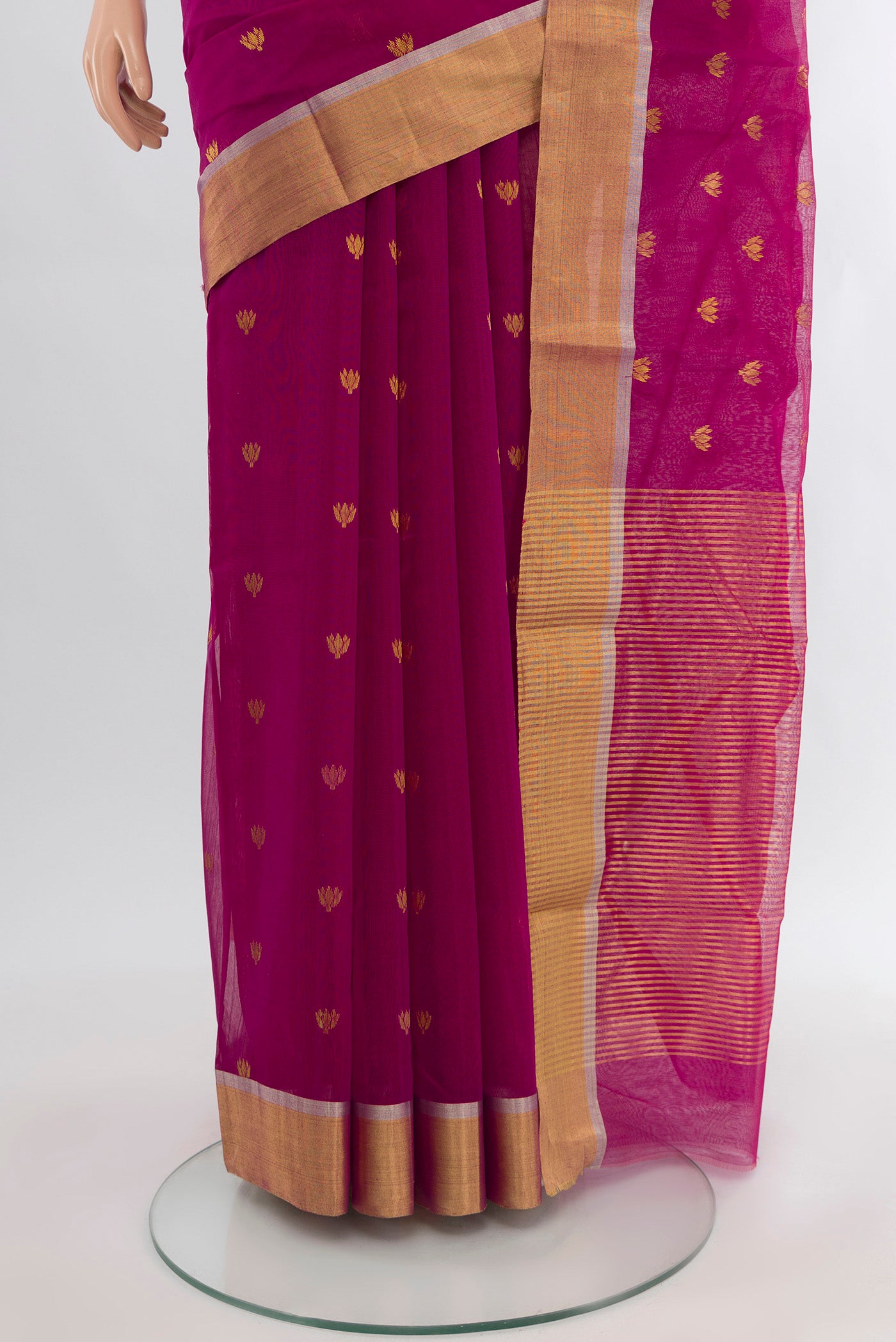 Pleats and pallu of Magenta Chanderi Silk Cotton Saree with Zari Butta on the body and Zari Border. 