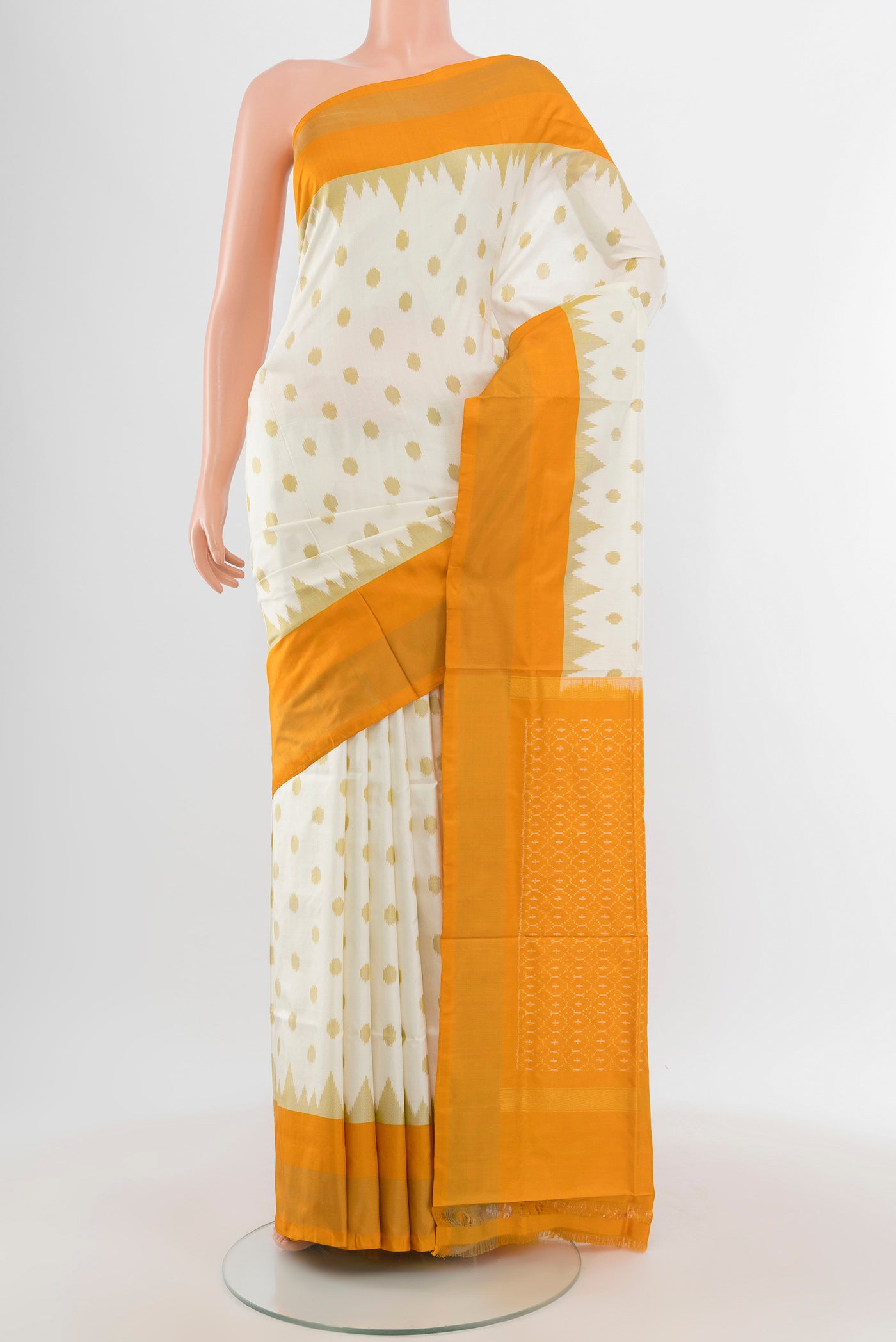Off White Pochampally Silk Saree with Pure Ikat on the body and Zari Border.  displayed on a mannequin