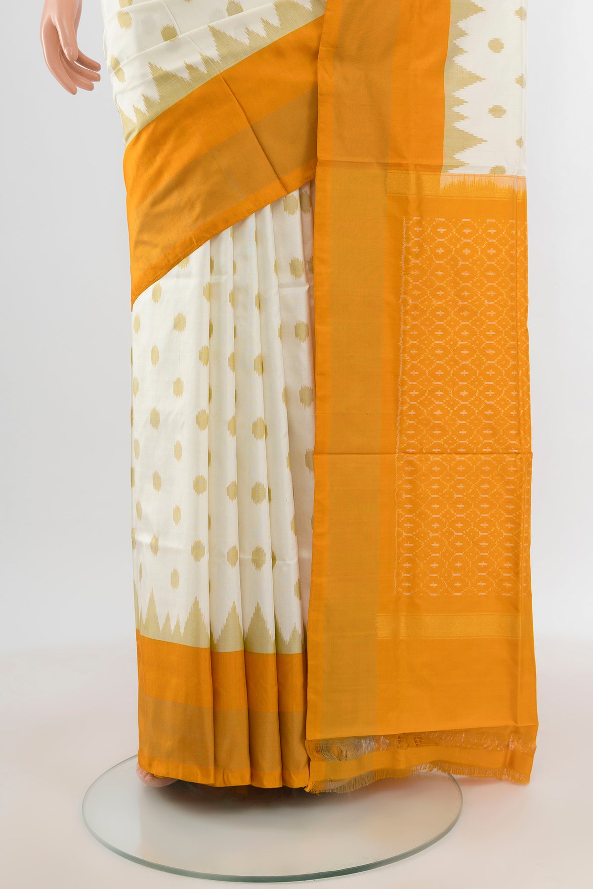Pleats and pallu of Off White Pochampally Silk Saree with Pure Ikat on the body and Zari Border. 