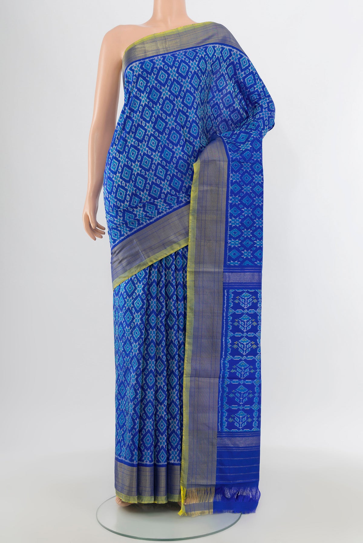 Royal Blue Pochampally Silk Saree with Pure Ikat on the body and Zari Border.  displayed on a mannequin