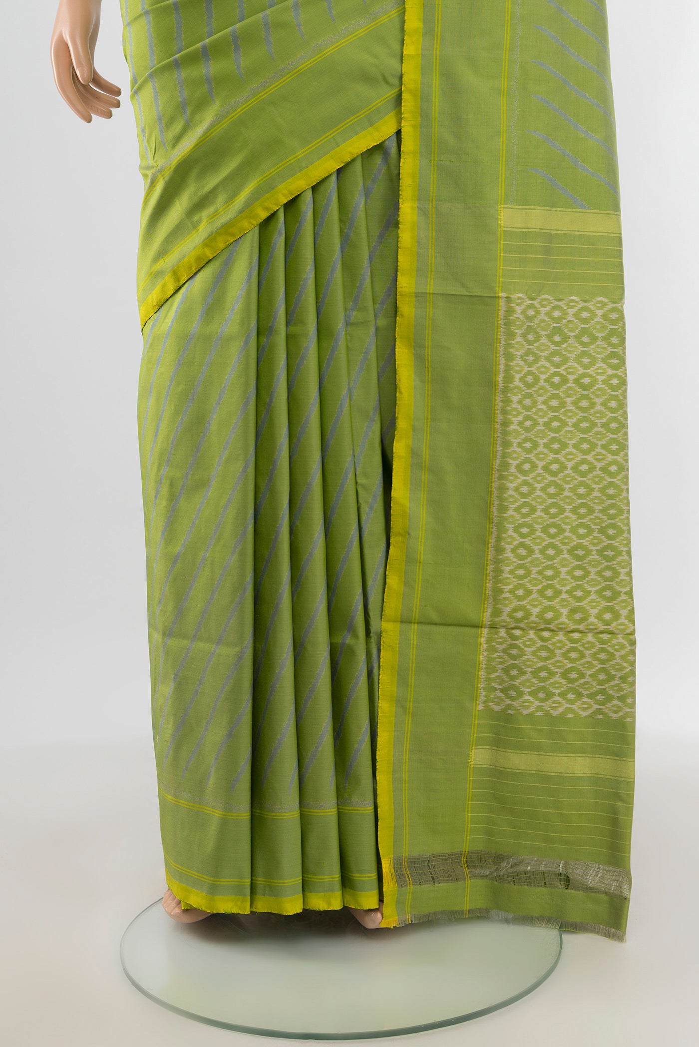 Pleats and pallu of Light Green Pochampally Silk Saree with Ikat design on the body and Plain Border. 