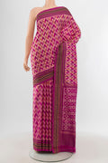 Magenta Pochampally Silk Saree with Ikat design on the body and Plain Border.  displayed on a mannequin