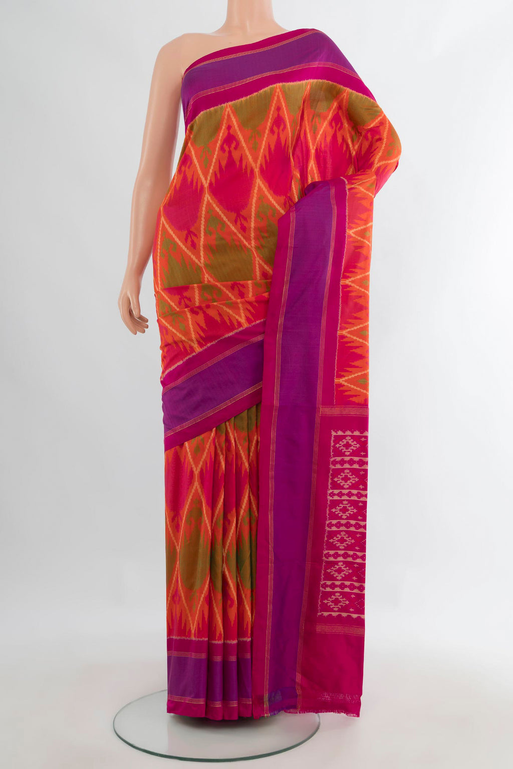 Pure Silk Multi Color Pochampally Saree with Ikat design on the body and Plain Border.  displayed on a mannequin