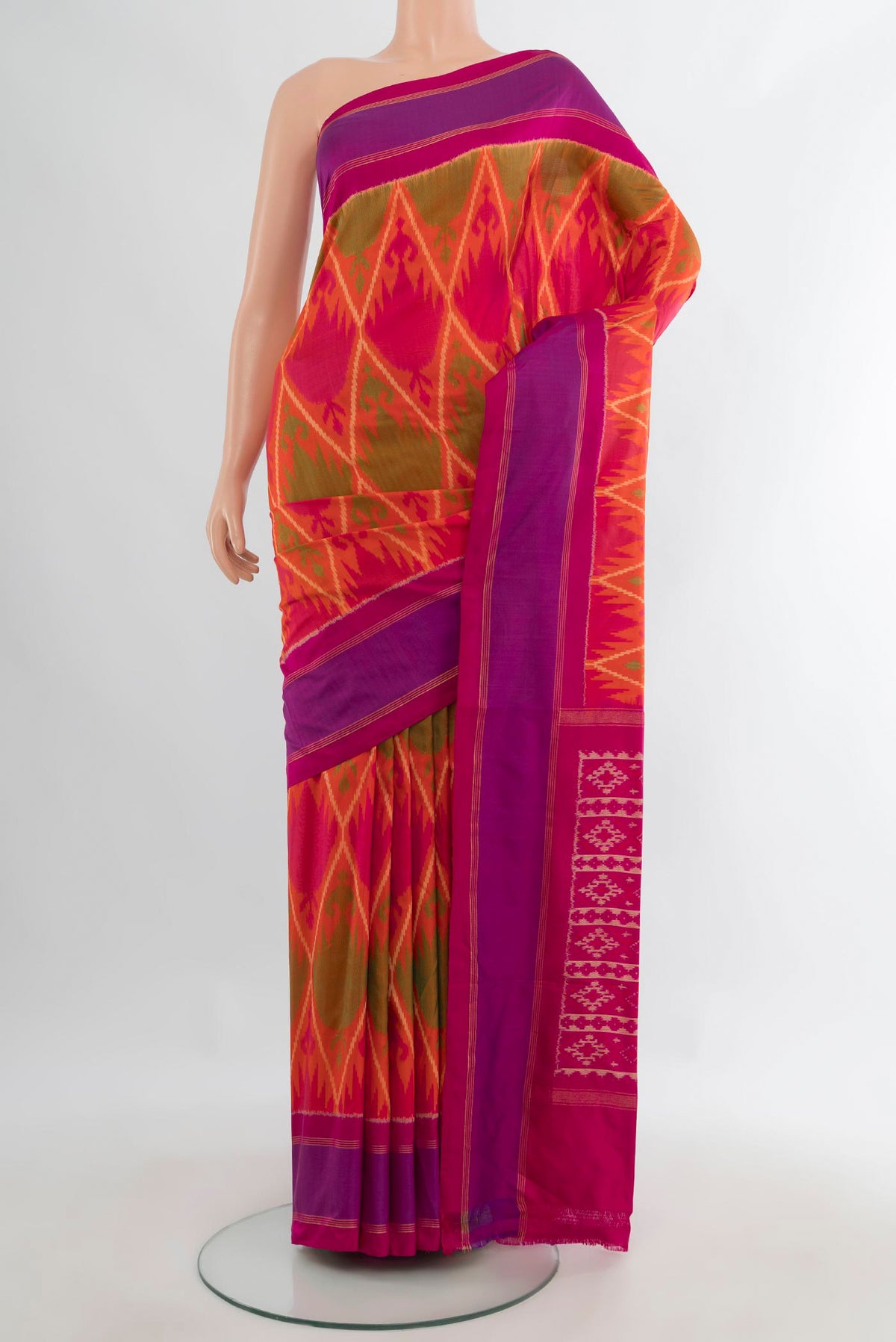 Pure Silk Multi Color Pochampally Saree with Ikat design on the body and Plain Border.  displayed on a mannequin